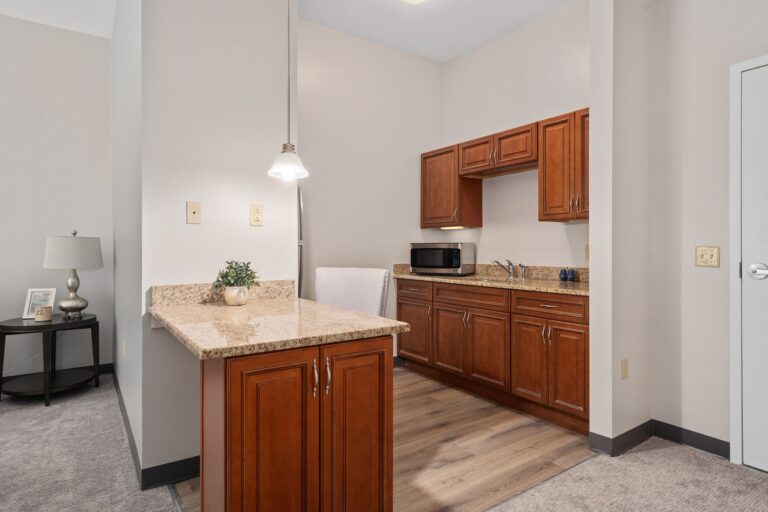 Model apartment kitchenette at Gentry Park Orlando senior living