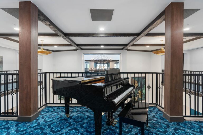 Piano lounge at The Grove at Trelago senior living community